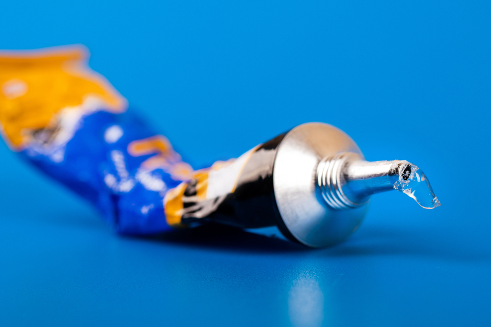 Removing Super glue from skin and other household surfaces